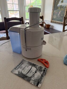 Jack Lelanns Electric Juicer with Blue Pulp Container